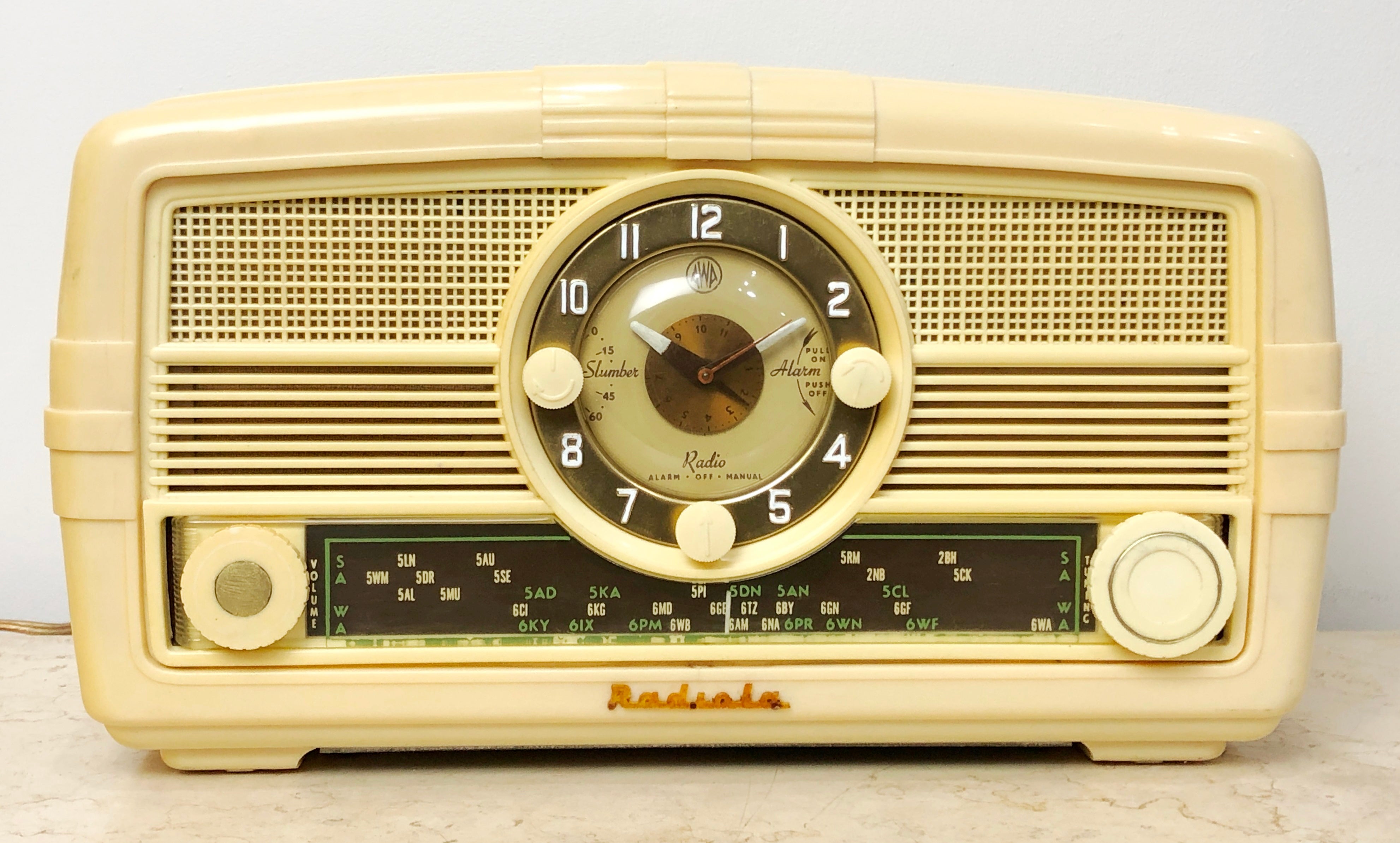 Vintage AWA Radiola with Clock Transistor Tube Mantel Radio | eXibit collection