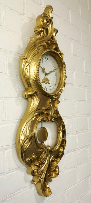 Vintage Figural Gold Pendulum Battery Wall Clock | eXibit collection