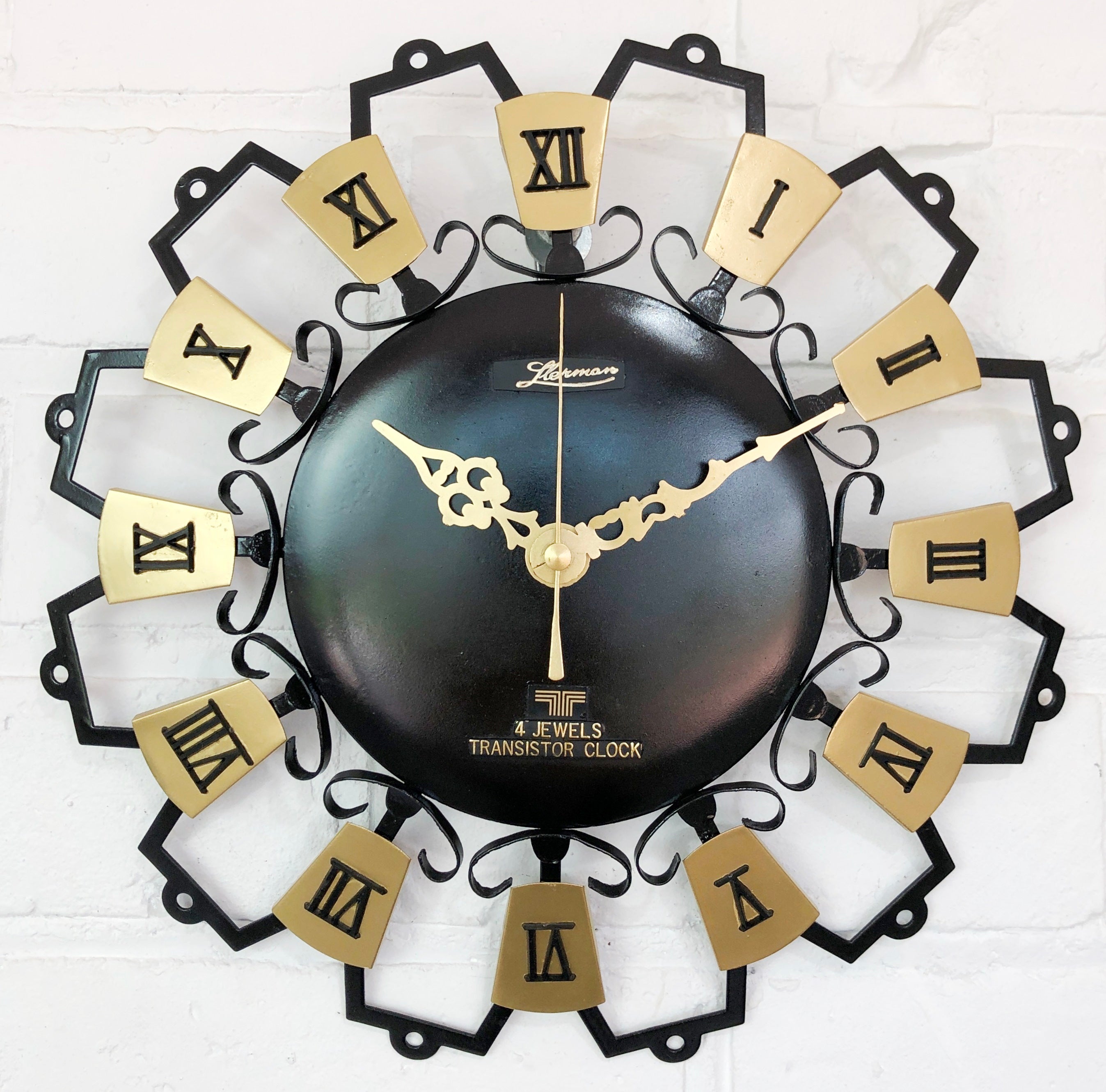 Vintage MANIX Starburst Battery Wall Clock | eXibit collection