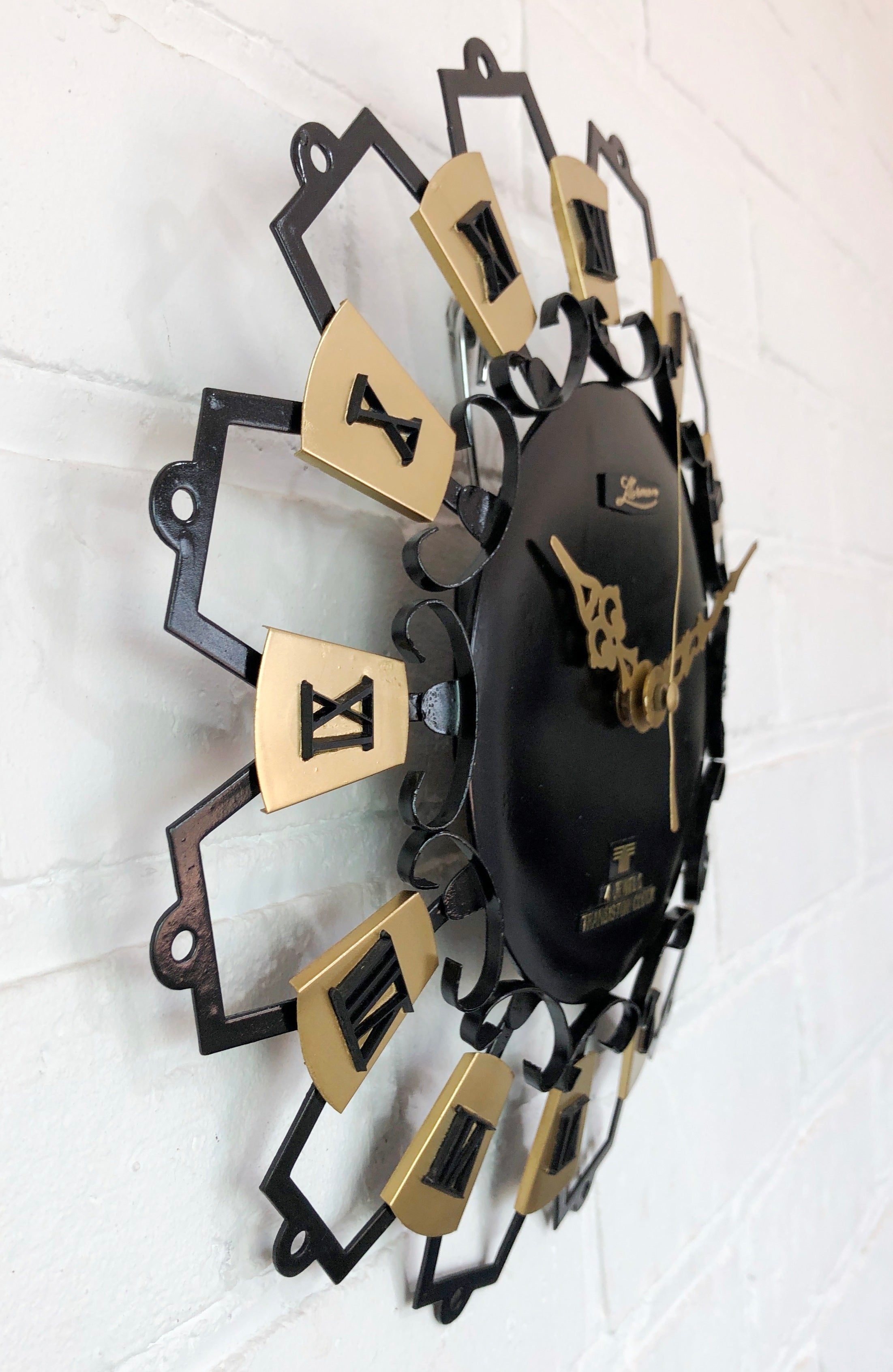 Vintage MANIX Starburst Battery Wall Clock | eXibit collection