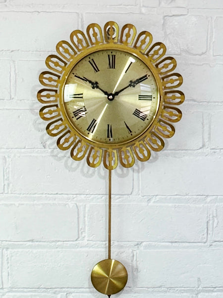 Vintage German Starburst Metal Pendulum Battery Wall Clock | eXibit collection