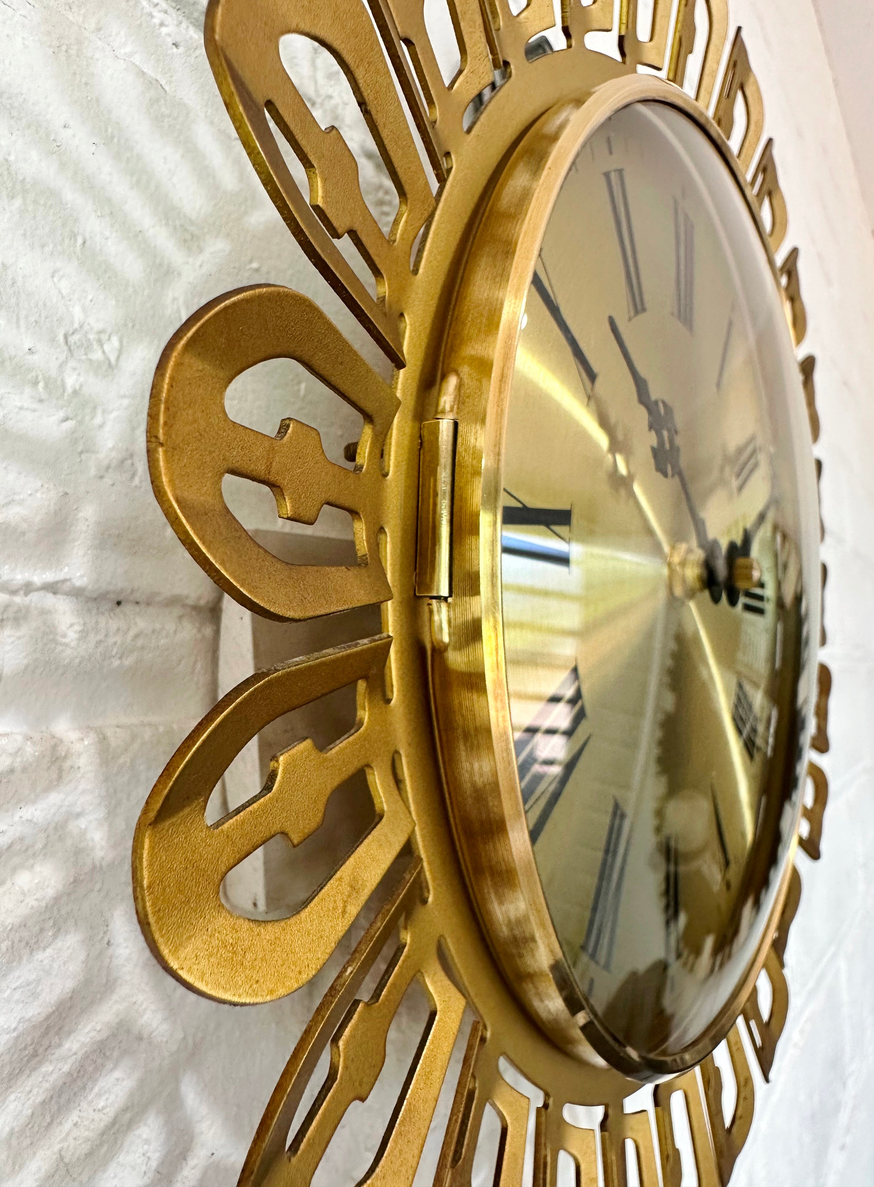 Vintage German Starburst Metal Pendulum Battery Wall Clock | eXibit collection