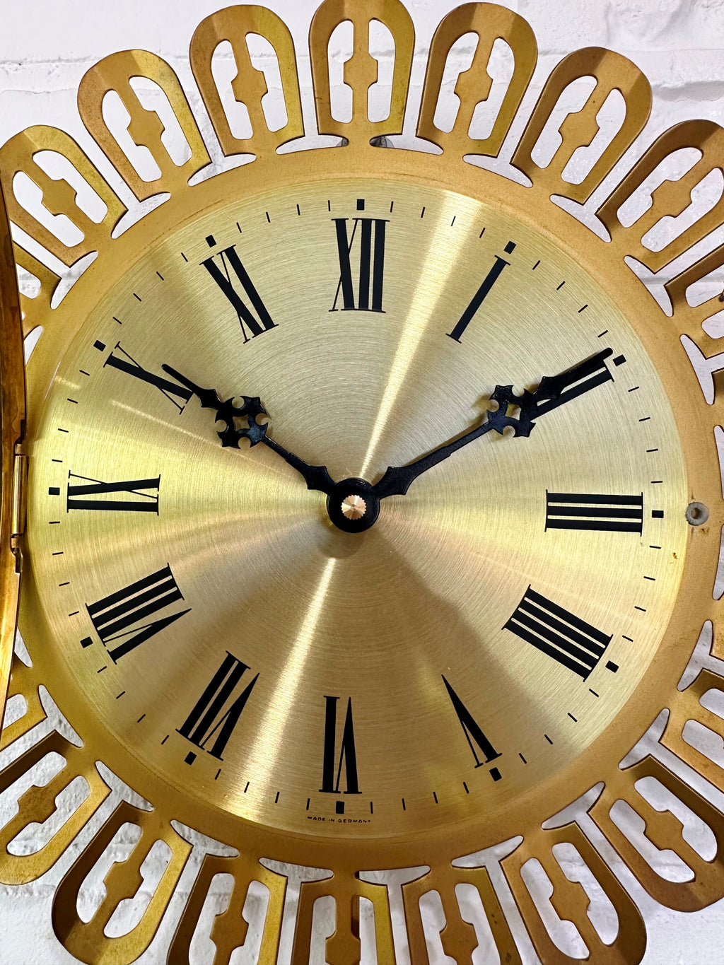 Vintage German Starburst Metal Pendulum Battery Wall Clock | eXibit collection