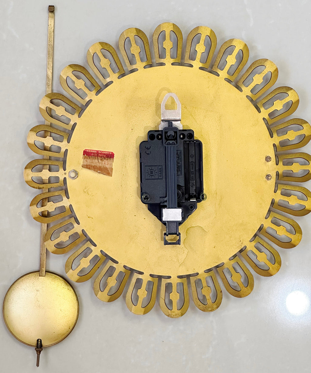 Vintage German Starburst Metal Pendulum Battery Wall Clock | eXibit collection